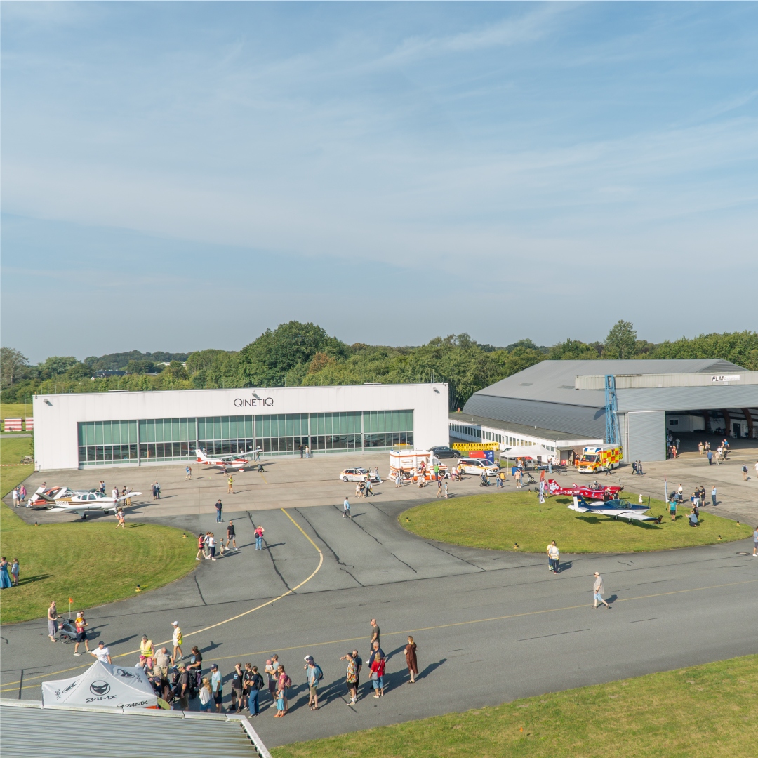 Panoramic view of two hangars